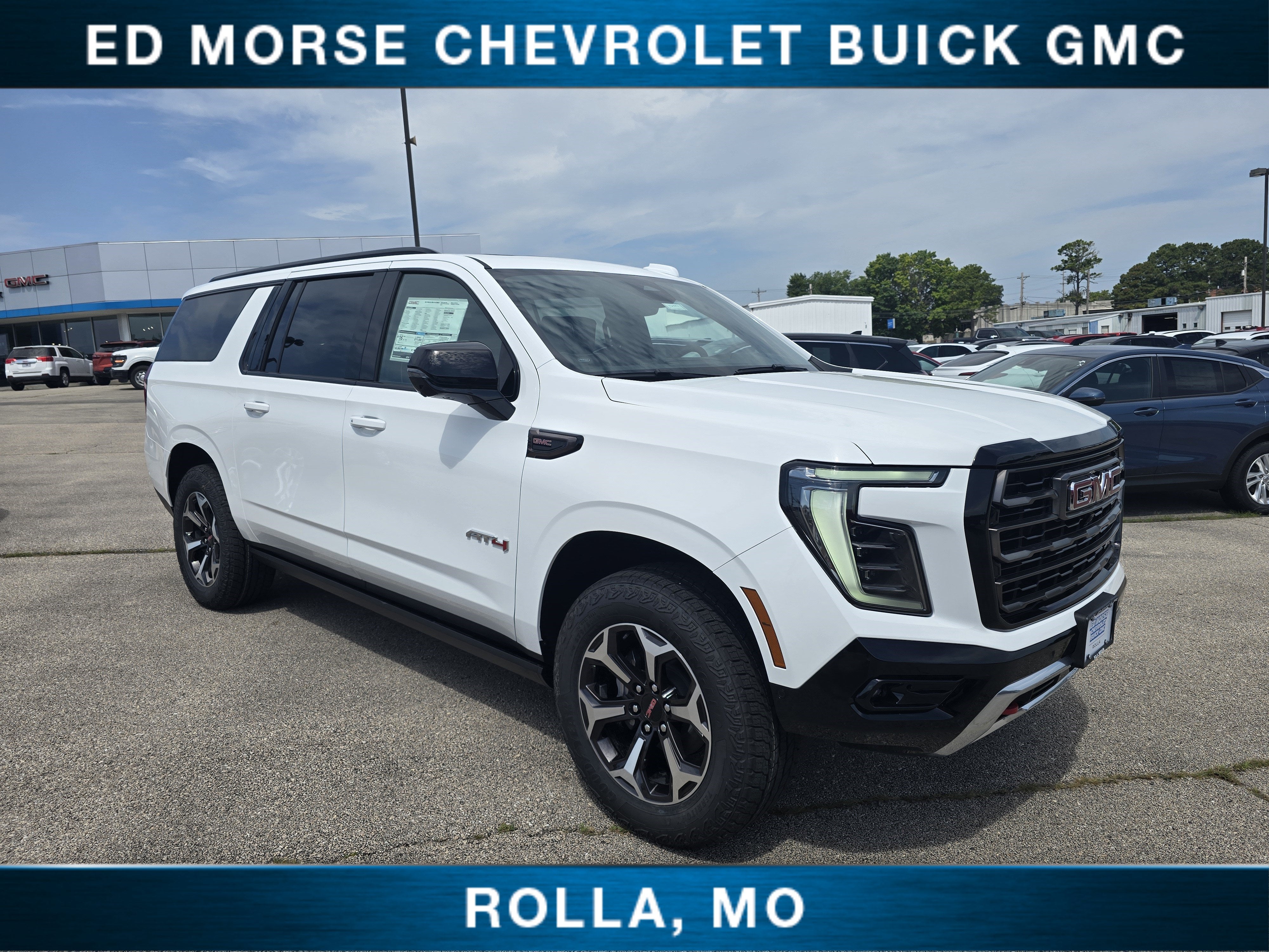 2026 GMC Yukon XL AT4 Ultimate in Summit White — front three-quarter view