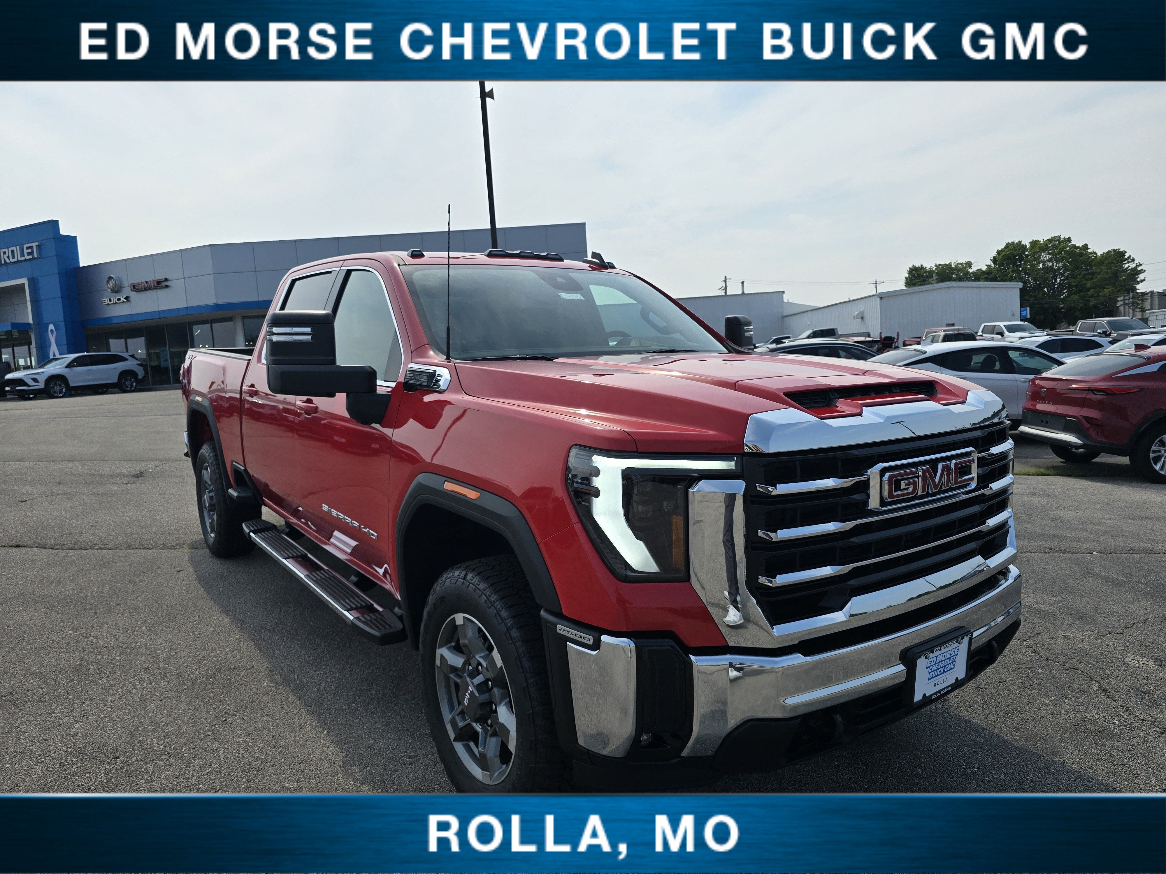 2026 GMC Sierra 2500 HD SLE in Cardinal Red — front three-quarter view