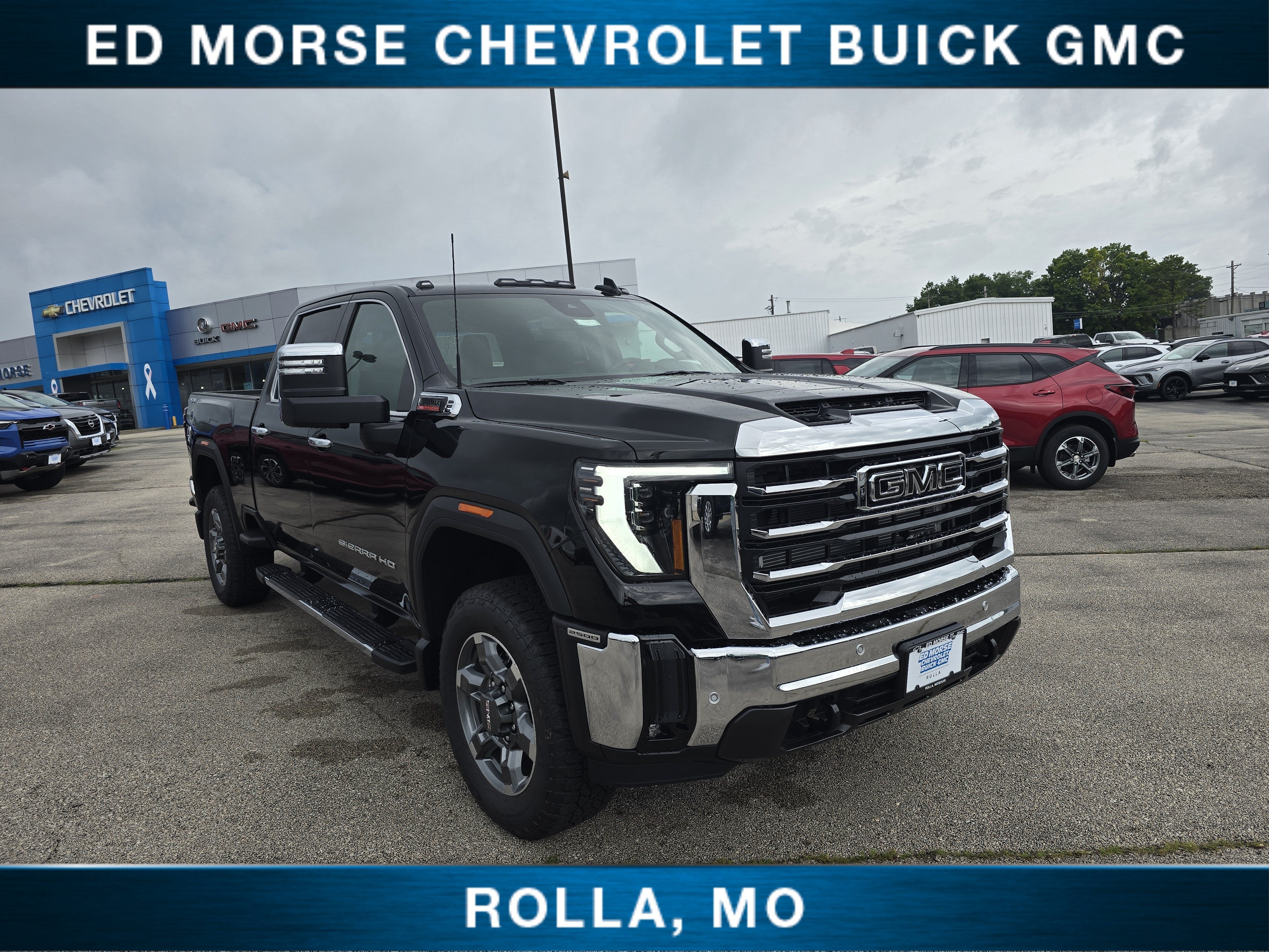 2026 GMC Sierra 2500 HD SLT in Onyx Black — front three-quarter view