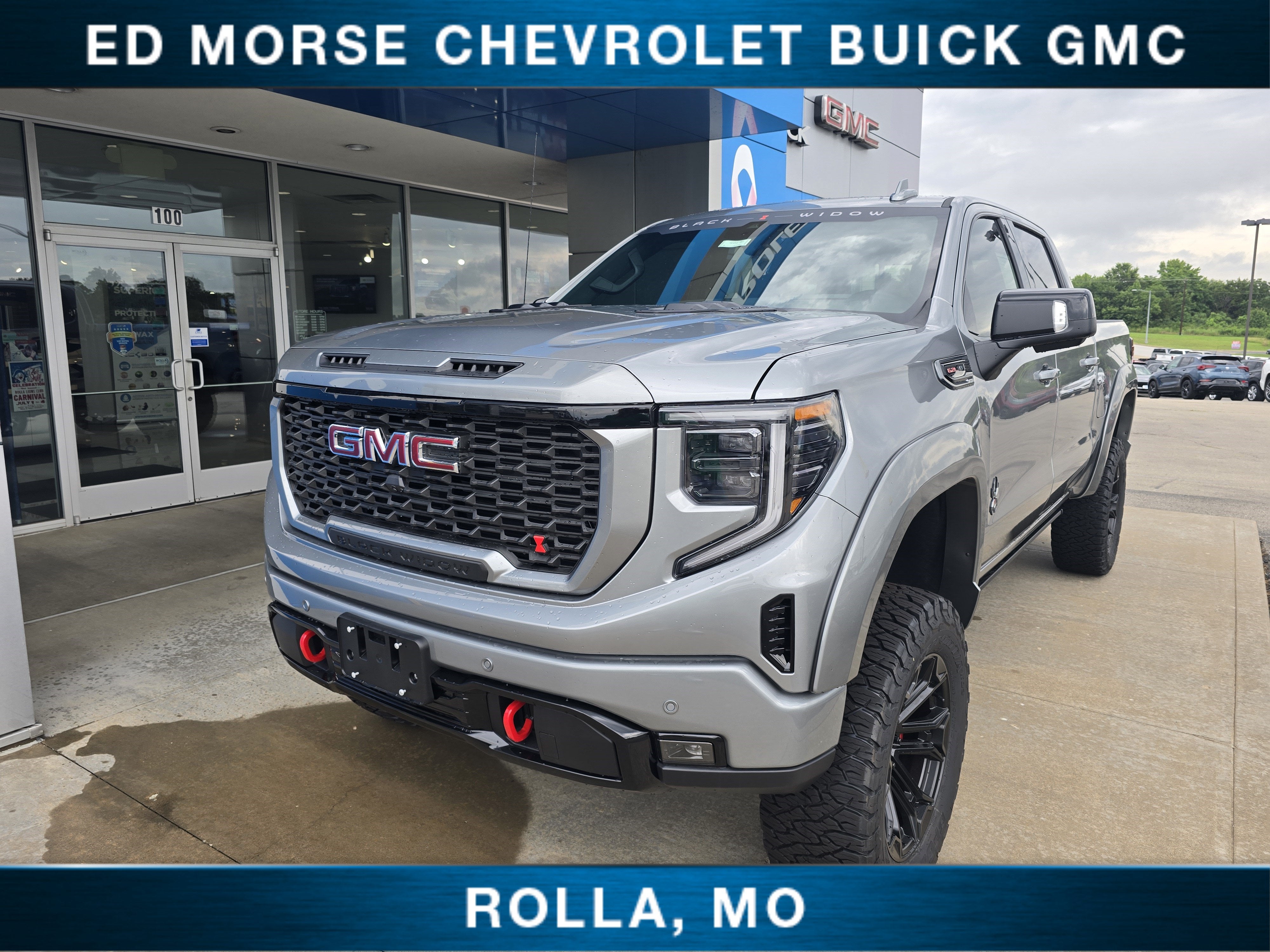2026 GMC Sierra 1500 AT4 in Sterling Metallic — front three-quarter view