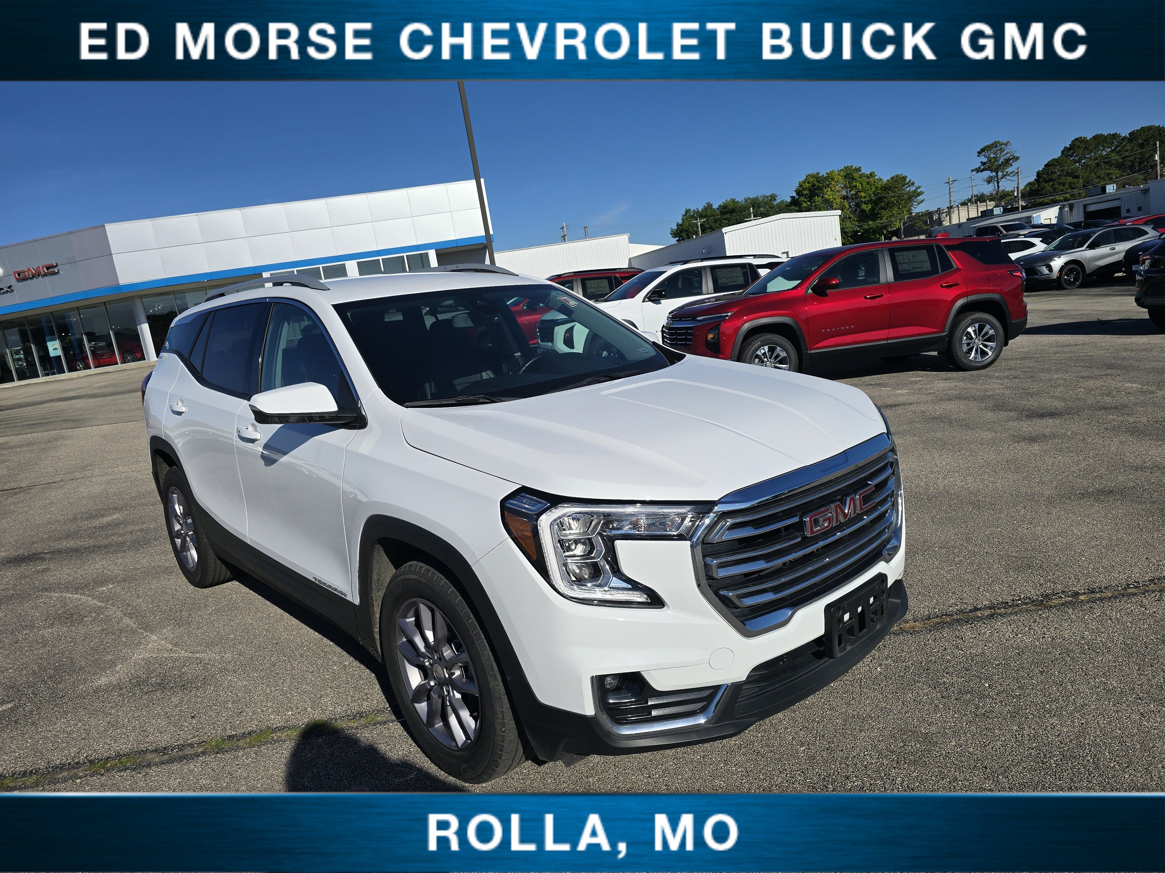 2024 GMC Terrain SLT in Summit White — front three-quarter view