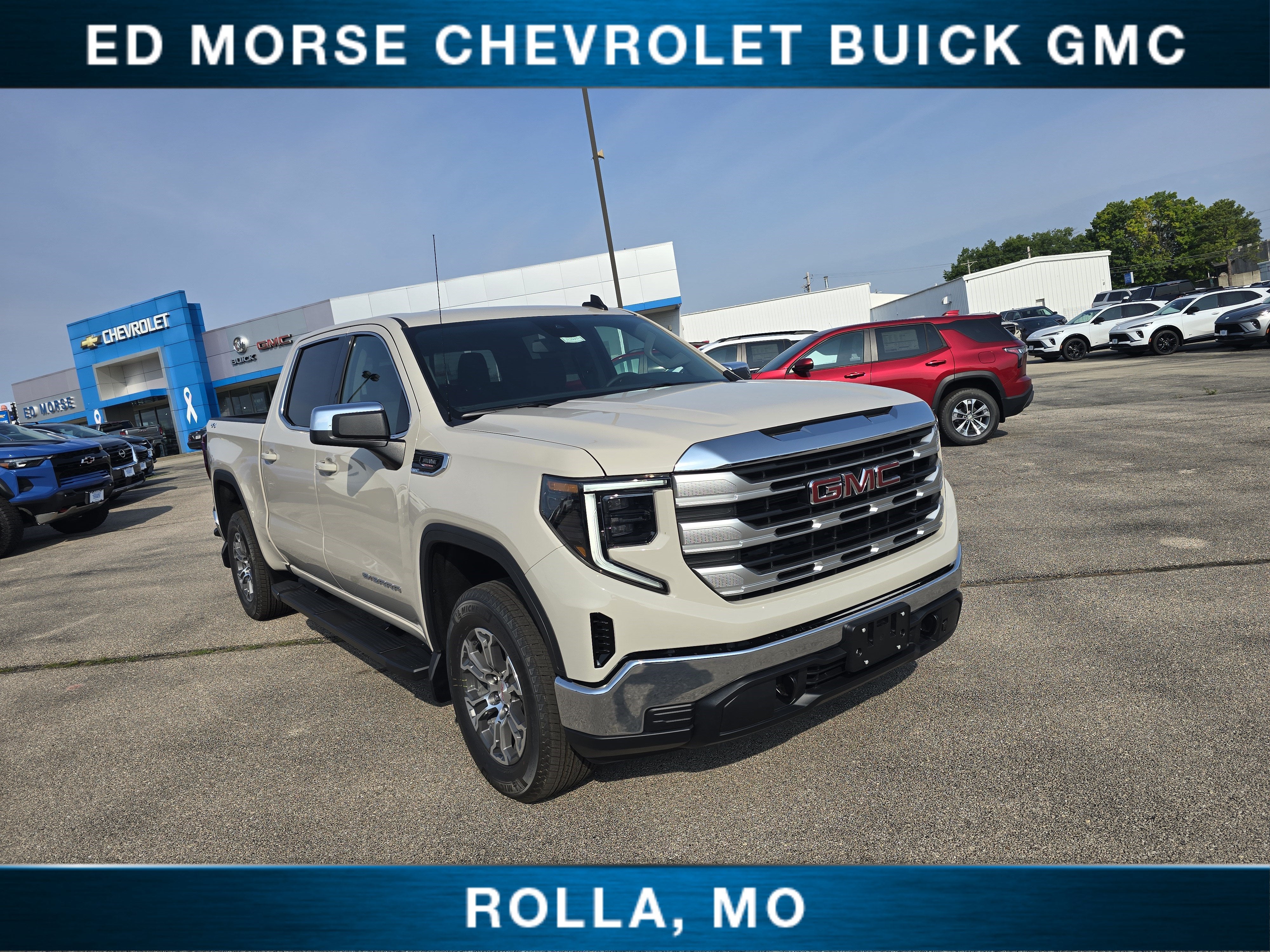 2026 GMC Sierra 1500 SLE in Coastal Dune — front three-quarter view