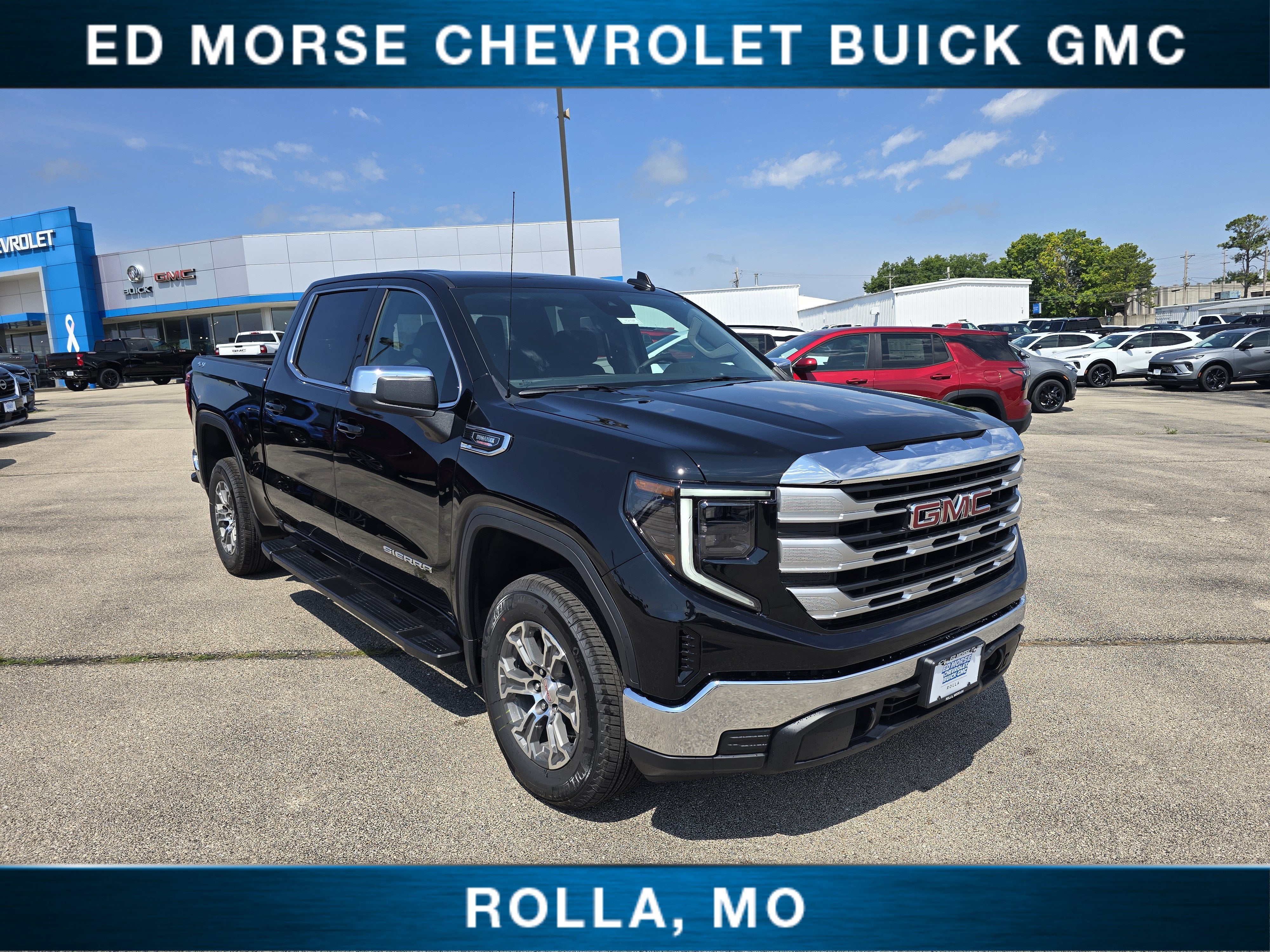 2026 GMC Sierra 1500 SLE in Onyx Black — front three-quarter view