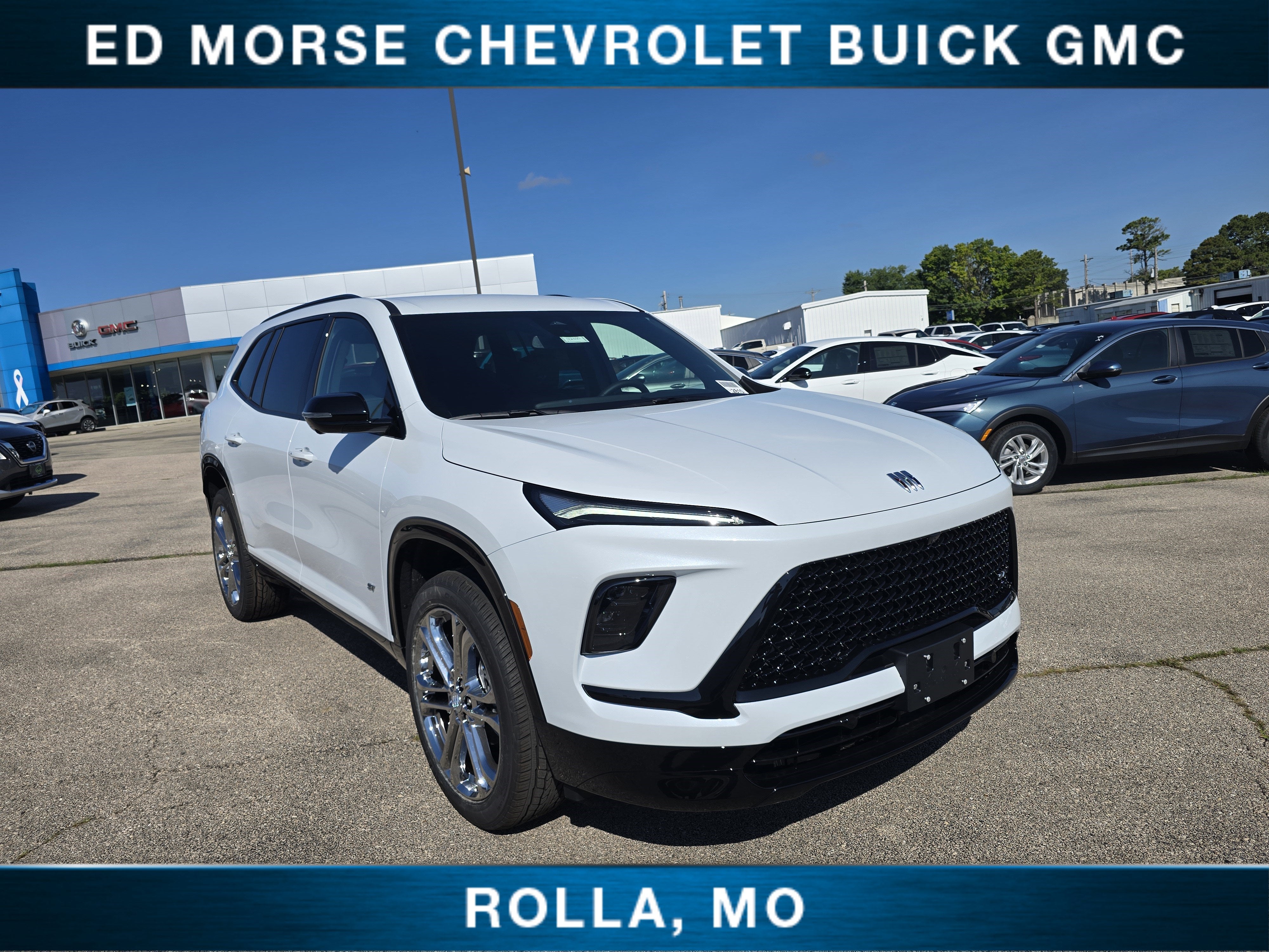 2026 Buick Enclave Sport Touring in Iridescent White Tricoat — front three-quarter view