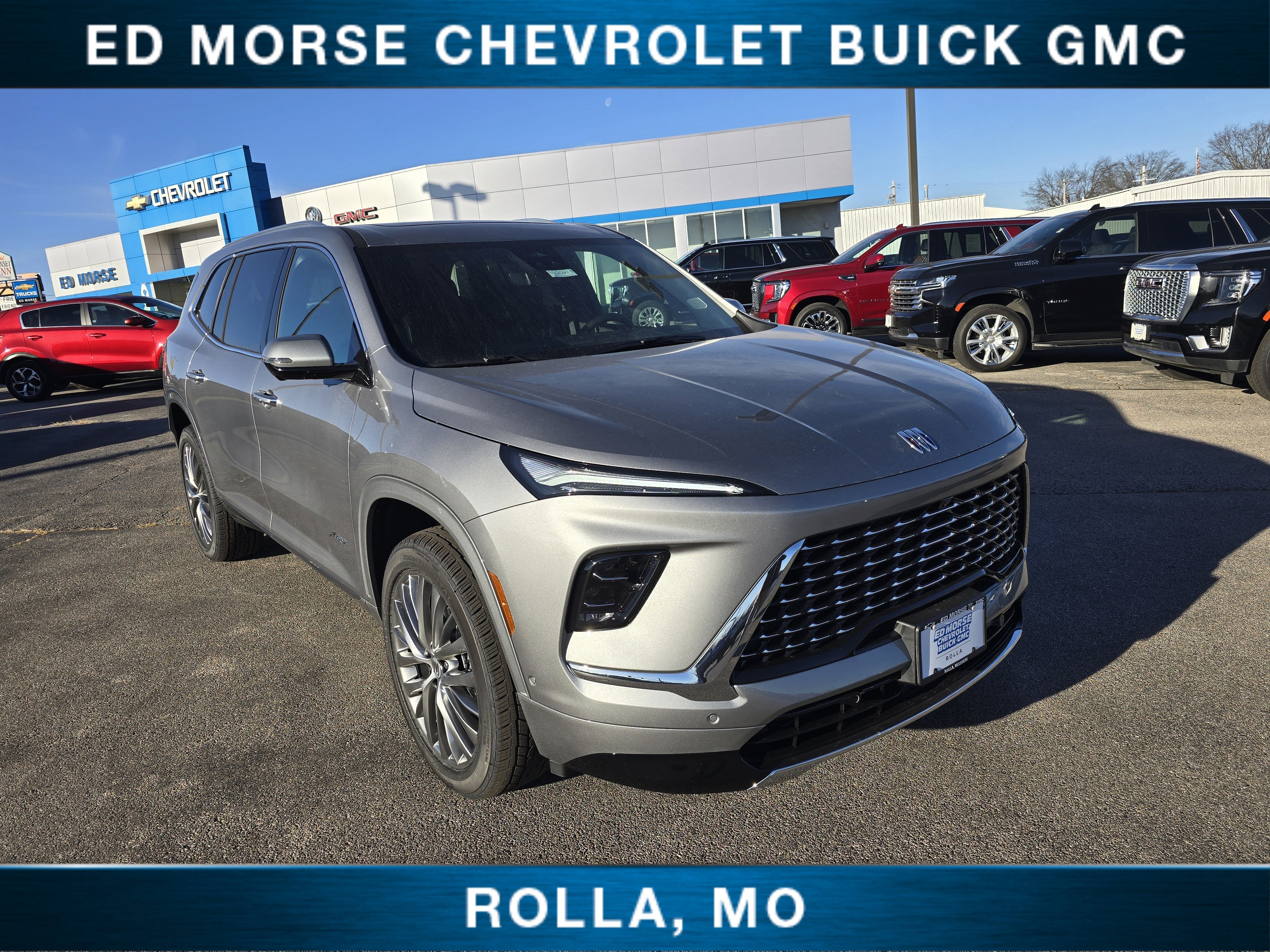 2026 Buick Enclave Avenir in Moonstone Gray Metallic — front three-quarter view