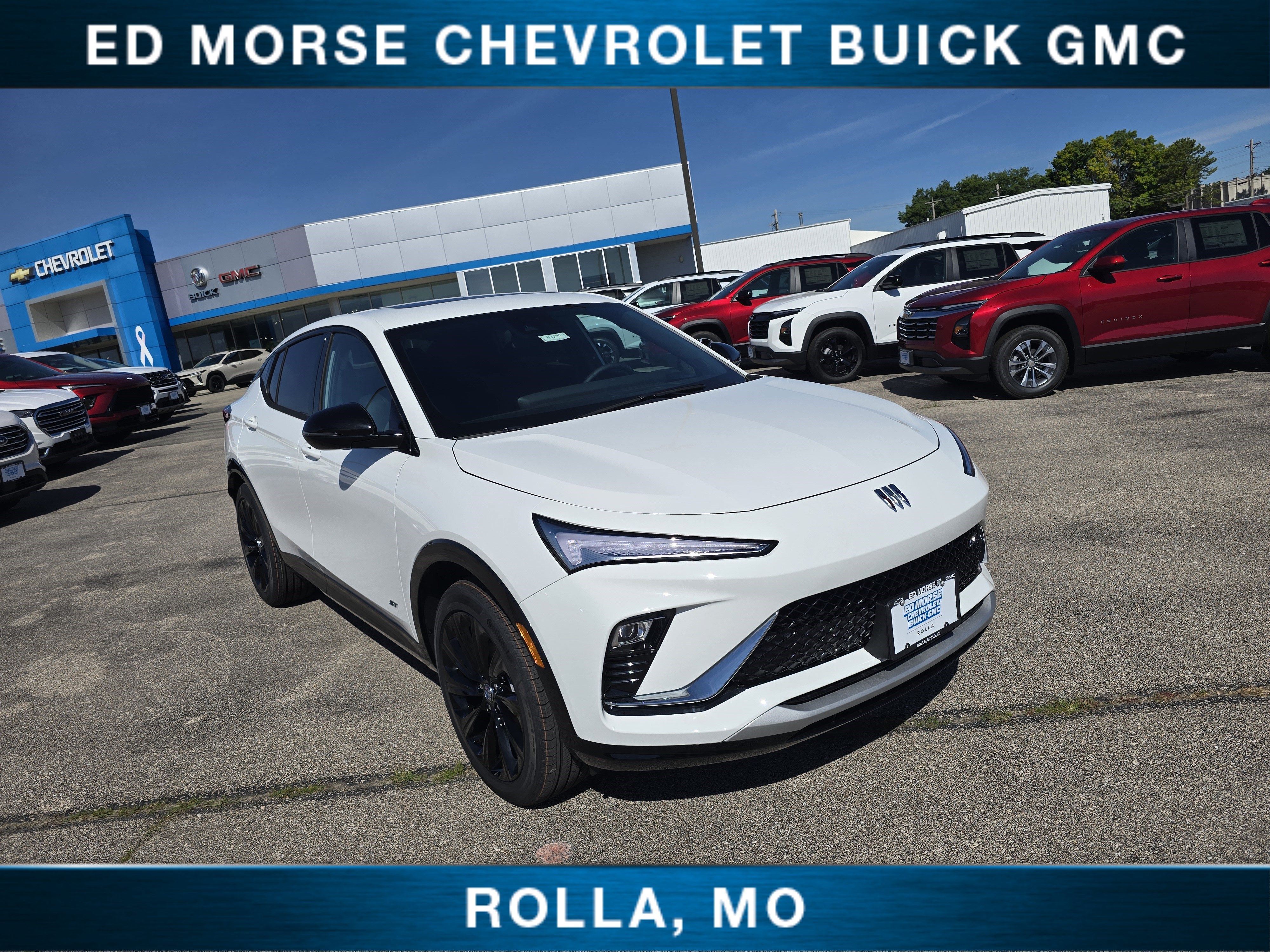2026 Buick Envista Sport Touring in Summit White — front three-quarter view